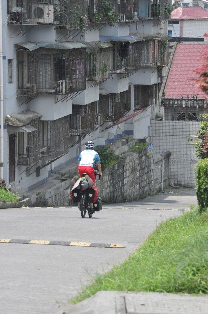 Rolling out from Jishou Teacher's College Photo Credit: Tony Wei Lu