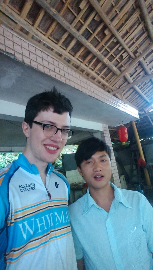 A new pengyou and I. His family owns a fish restaurant in the countryside south of Fenghuang, and he makes a mean tomato fried egg. He says he likes life in the countryside because it's calm and the environment is good.
